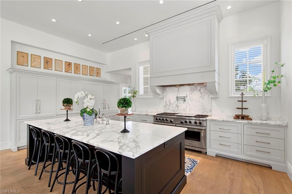 Interior, Kitchen, Marble Walls, Recessed Lighting, Stainless Steel Appliances, Wood Texture Flooring