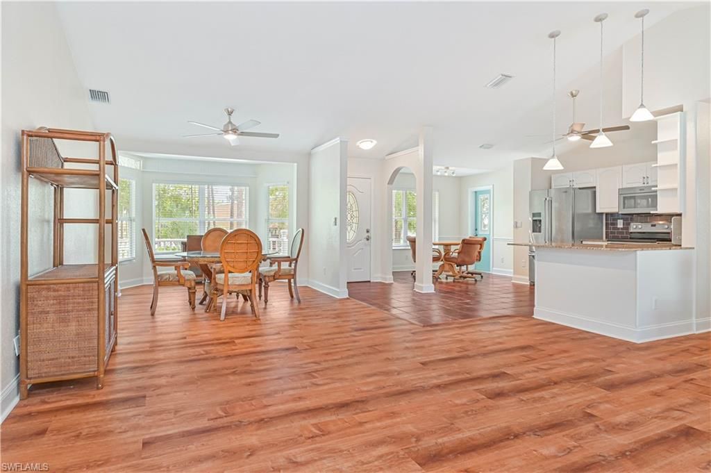 Dining room, Interior, Kitchen, Pendant Lights, Stainless Steel Appliances, Wood Texture Flooring