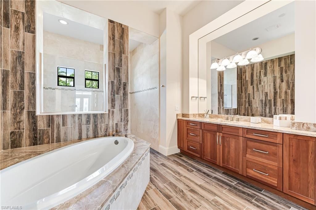 Bathroom, Dual Sink Vanities, Interior, Recessed Lighting, Wood Texture Flooring