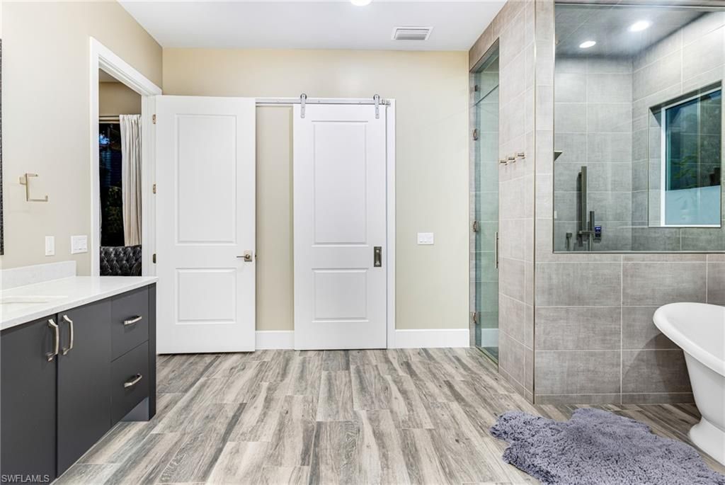 Bathroom, Glass Shower, Interior, Recessed Lighting, Wood Texture Flooring