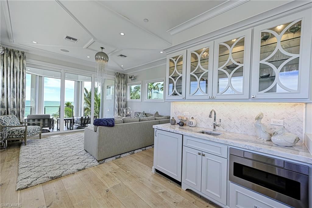 Chandelier, Interior, Kitchen, Living room, Recessed Lighting, Stainless Steel Appliances, Water, Wood Texture Flooring