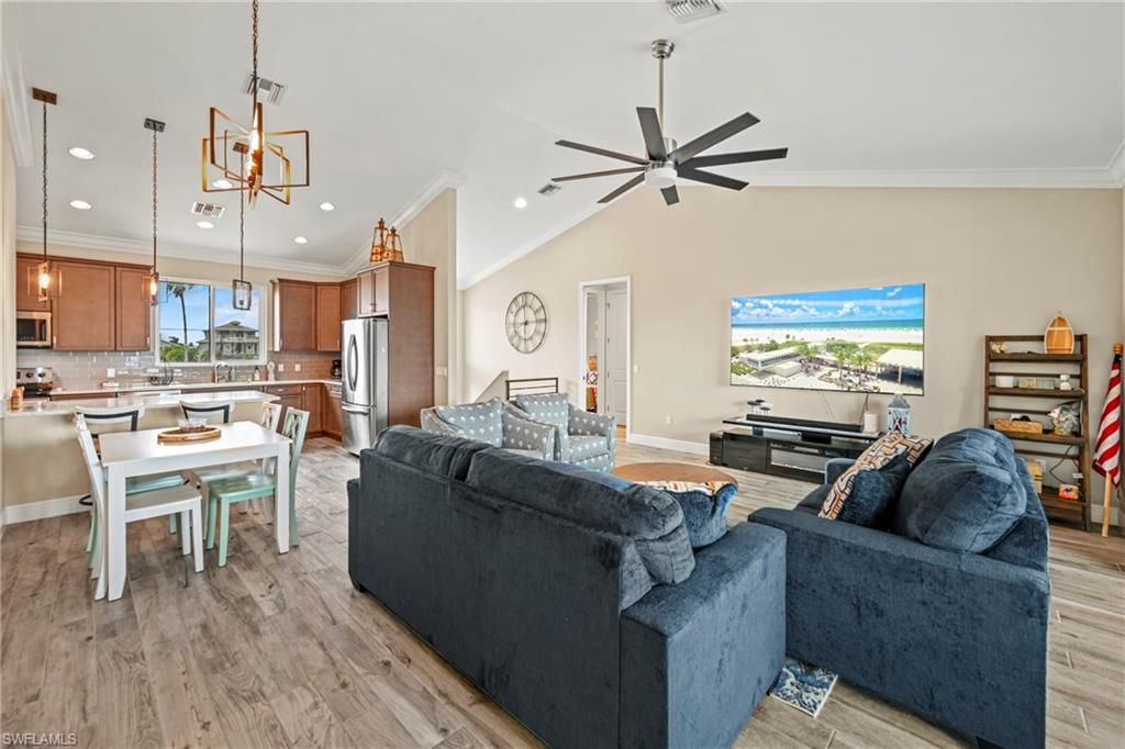 Dining room, Interior, Kitchen, Living room, Pendant Lights, Recessed Lighting, Stainless Steel Appliances, Wood Texture Flooring