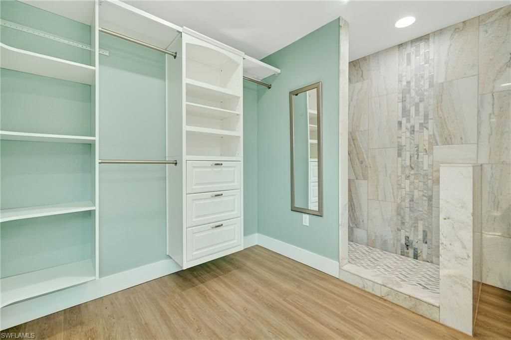 Bathroom, Interior, Marble Walls, Recessed Lighting, Walk-in Closets, Wood Texture Flooring