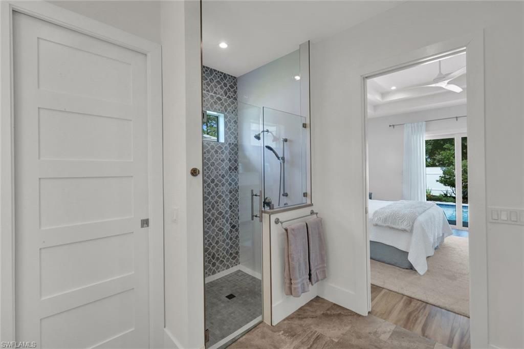 Bathroom, Bedroom, Glass Shower, Interior, Recessed Lighting, Wood Texture Flooring