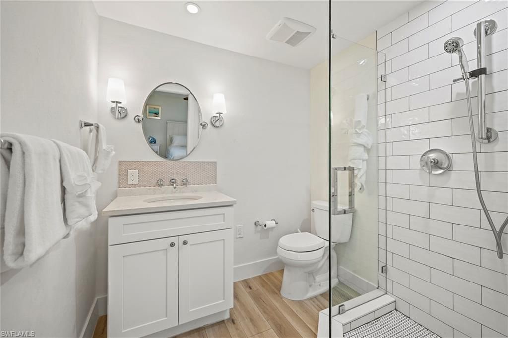 Bathroom, Glass Shower, Interior, Recessed Lighting, Wood Texture Flooring