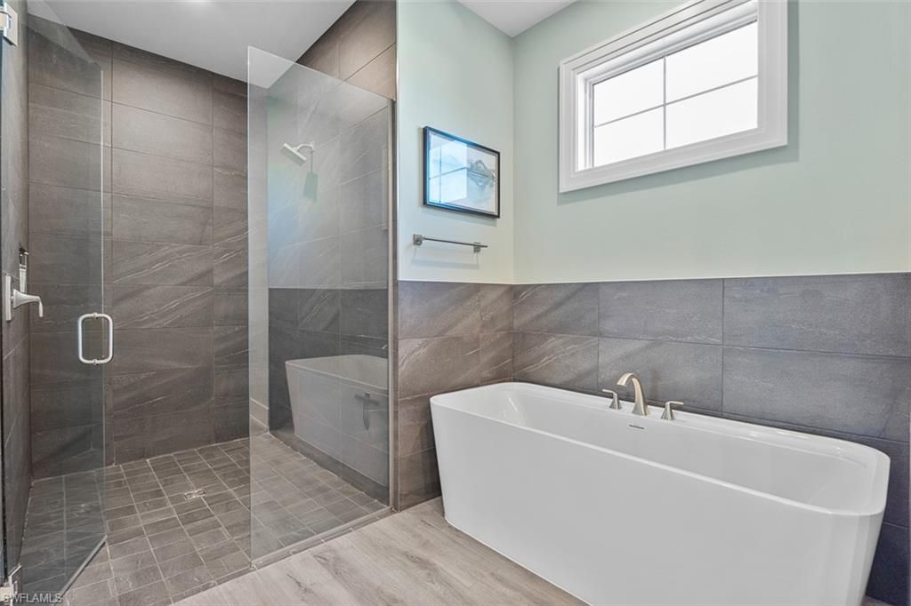 Bathroom, Free Standing Baths, Glass Shower, Interior, Wood Texture Flooring
