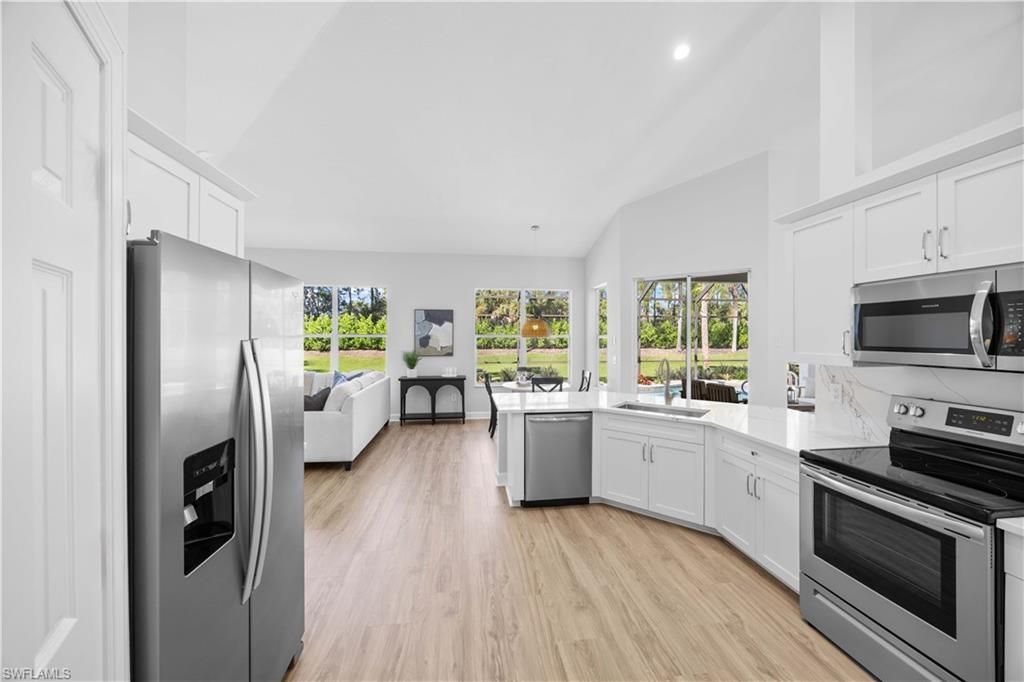 Interior, Kitchen, Living room, Pendant Lights, Recessed Lighting, Stainless Steel Appliances, Wood Texture Flooring