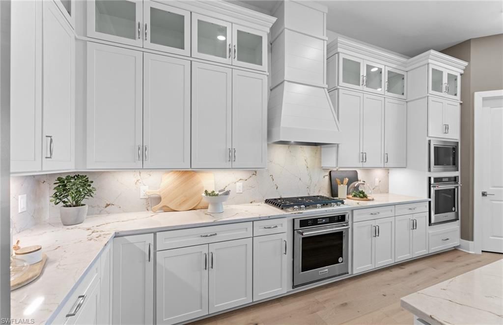 Interior, Kitchen, Marble Walls, Stainless Steel Appliances, Wood Texture Flooring