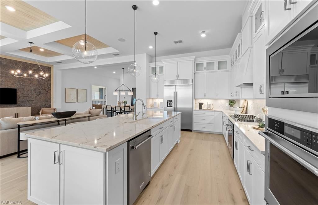 Interior, Kitchen, Pendant Lights, Recessed Lighting, Stainless Steel Appliances, Wood Texture Flooring