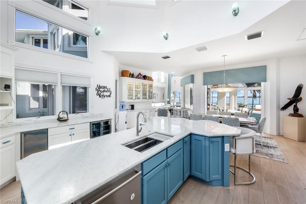 Dining room, Interior, Kitchen, Pendant Lights, Stainless Steel Appliances, Water, Wood Texture Flooring