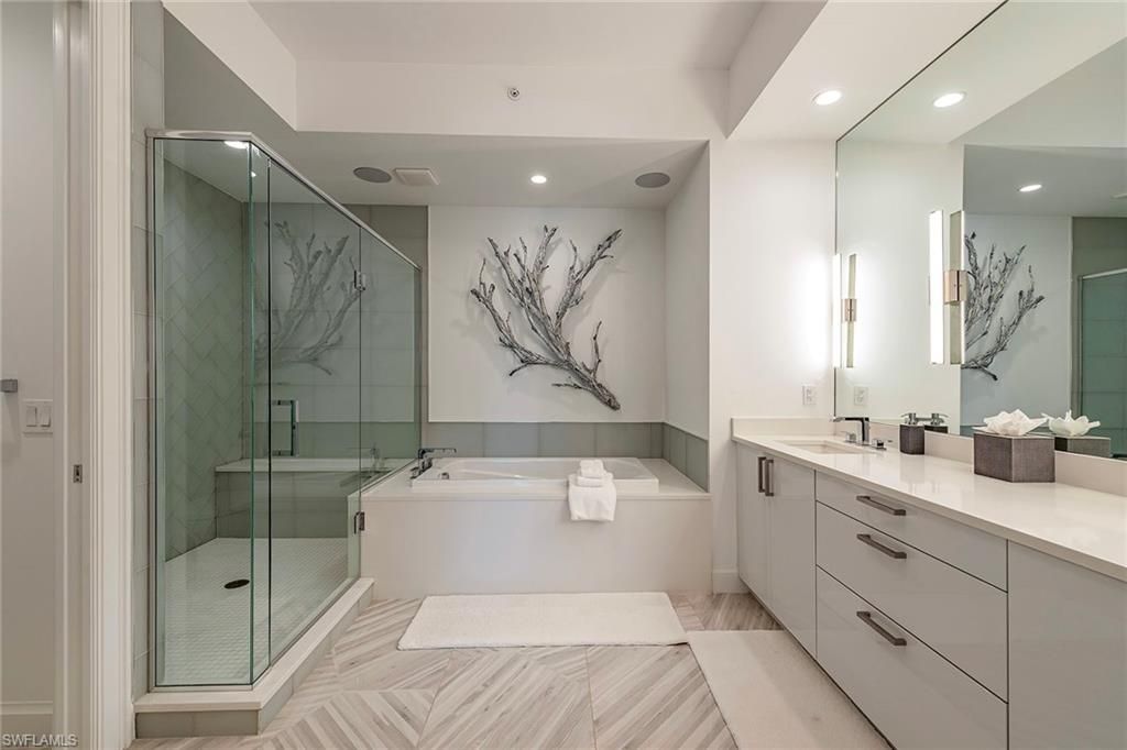 Bathroom, Dual Sink Vanities, Glass Shower, Interior, Recessed Lighting, Wood Texture Flooring