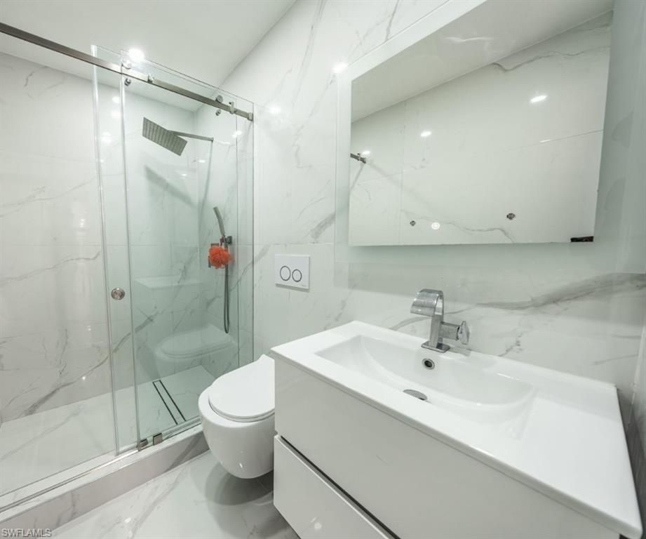 Bathroom, Glass Shower, Interior, Marble, Marble Walls, Recessed Lighting