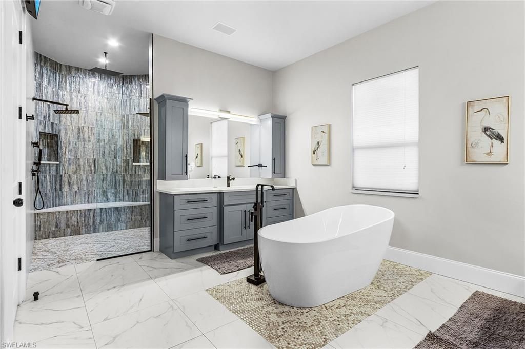 Bathroom, Dual Sink Vanities, Free Standing Baths, Glass Shower, Interior, Marble, Recessed Lighting