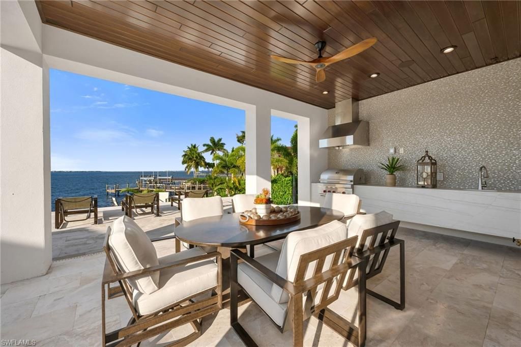 Exterior, Outdoor Kitchen, Recessed Lighting, Water, Wooden Ceilings