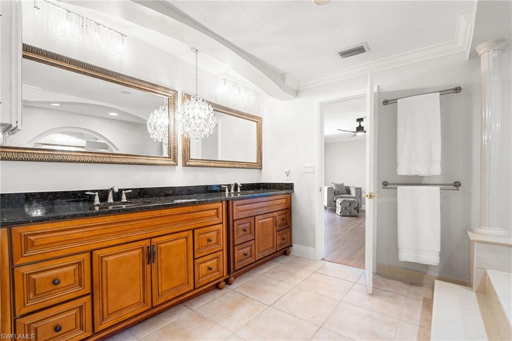 Bathroom, Chandelier, Dual Sink Vanities, Interior, Recessed Lighting, Wood Texture Flooring