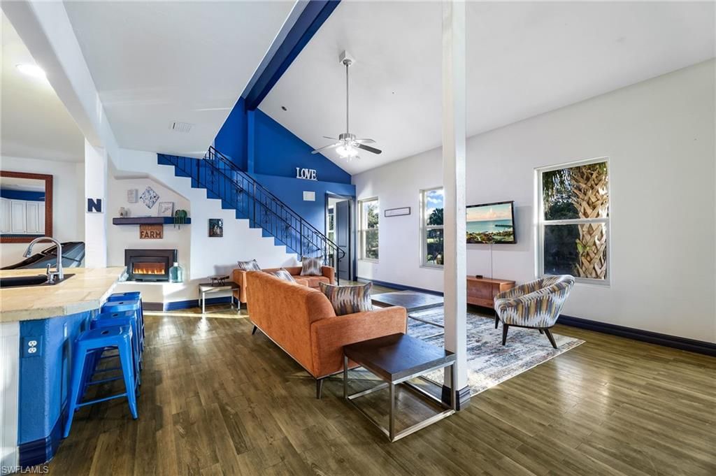 Fireplace, Interior, Living room, Recessed Lighting, Wood Texture Flooring