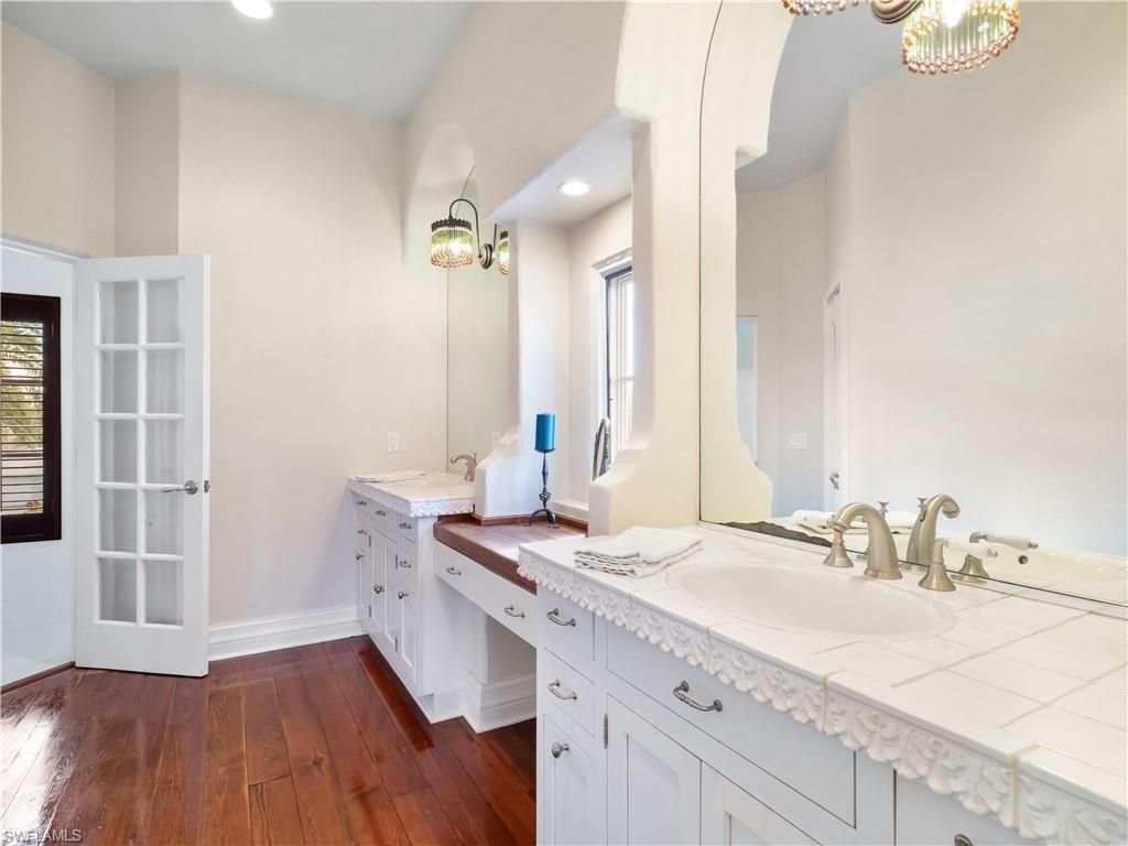 Bathroom, Dual Sink Vanities, Interior, Recessed Lighting, Tile Countertops, Wood Texture Flooring