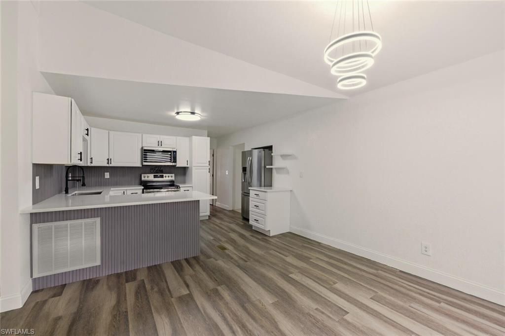 Interior, Kitchen, Pendant Lights, Stainless Steel Appliances, Wood Texture Flooring