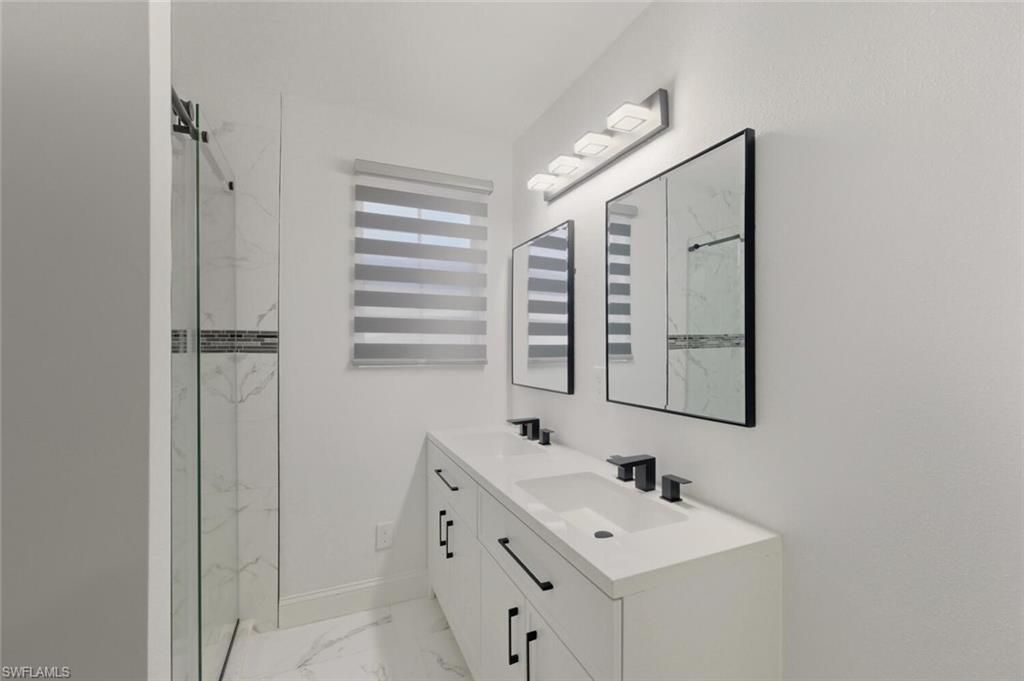 Bathroom, Dual Sink Vanities, Glass Shower, Interior, Marble, Marble Walls