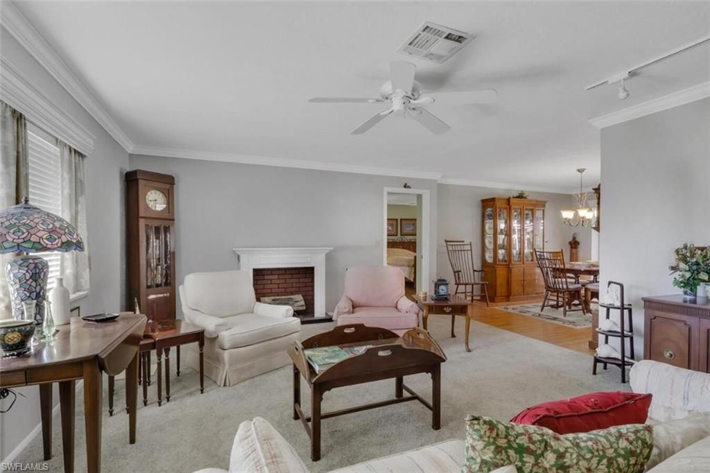 Chandelier, Dining room, Fireplace, Interior, Living room, Wood Texture Flooring