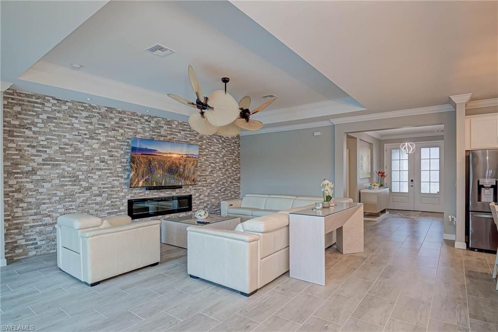 Fireplace, Interior, Living room, Stainless Steel Appliances, Stone Walls, Wood Texture Flooring