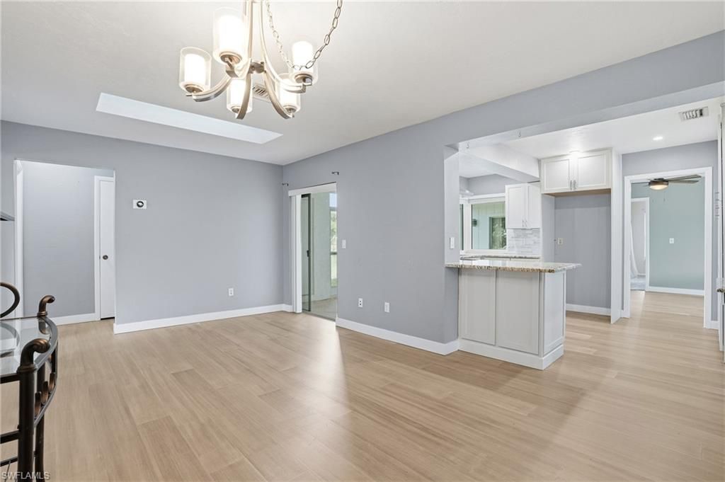 Chandelier, Empty room, Interior, Kitchen, Recessed Lighting, Wood Texture Flooring