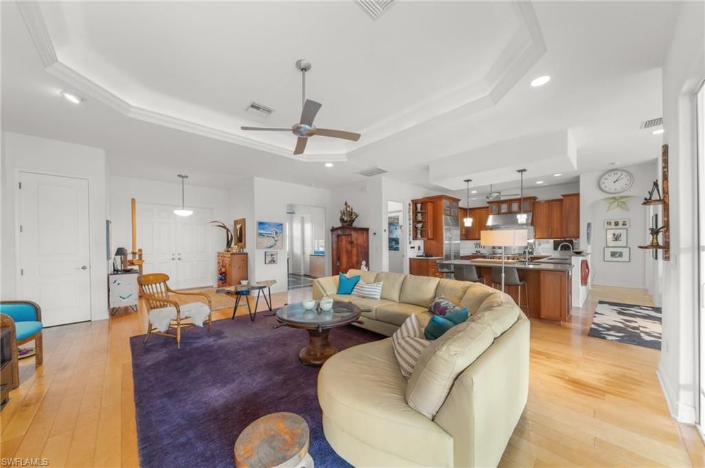 Dining room, Interior, Kitchen, Living room, Pendant Lights, Recessed Lighting, Stainless Steel Appliances, Wood Texture Flooring