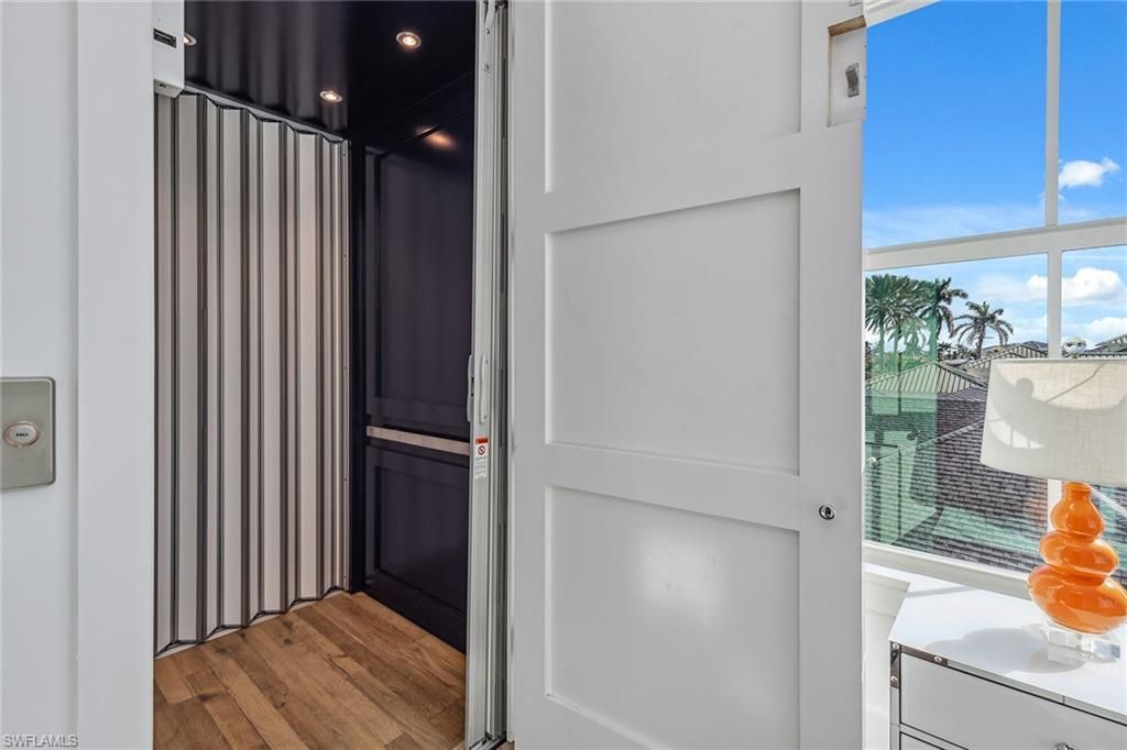 Elevator, Interior, Recessed Lighting, Wood Texture Flooring