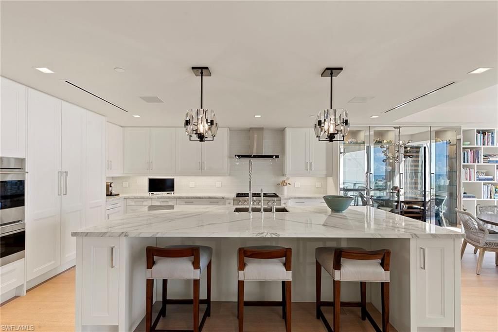 Chandelier, Interior, Kitchen, Pendant Lights, Recessed Lighting, Stainless Steel Appliances, Wood Texture Flooring