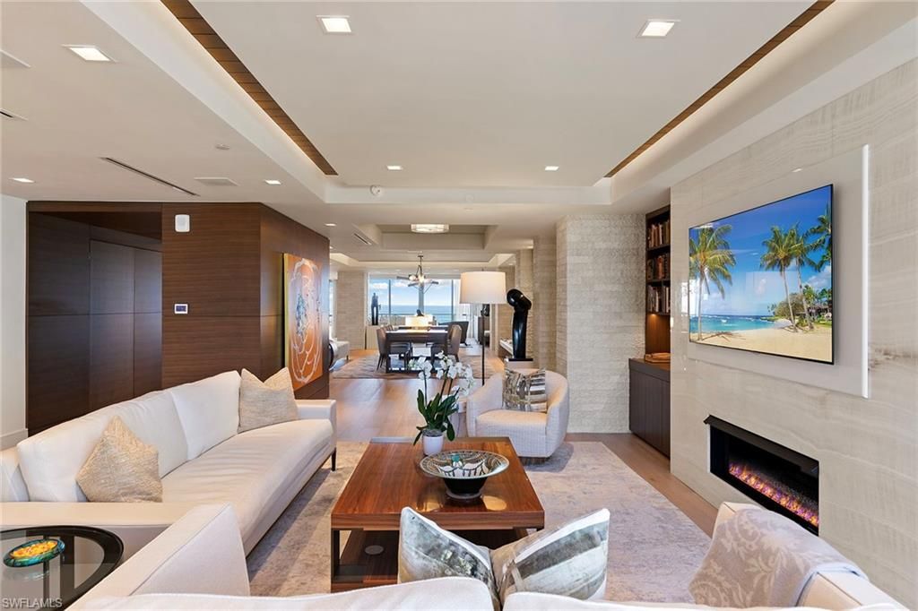 Dining room, Fireplace, Interior, Living room, Recessed Lighting, Wood Texture Flooring, Wooden Walls