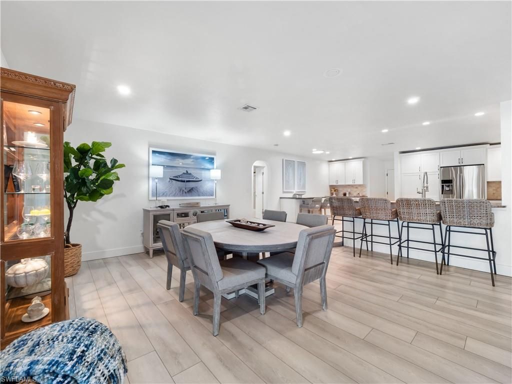 Dining room, Interior, Kitchen, Recessed Lighting, Stainless Steel Appliances, Wood Texture Flooring