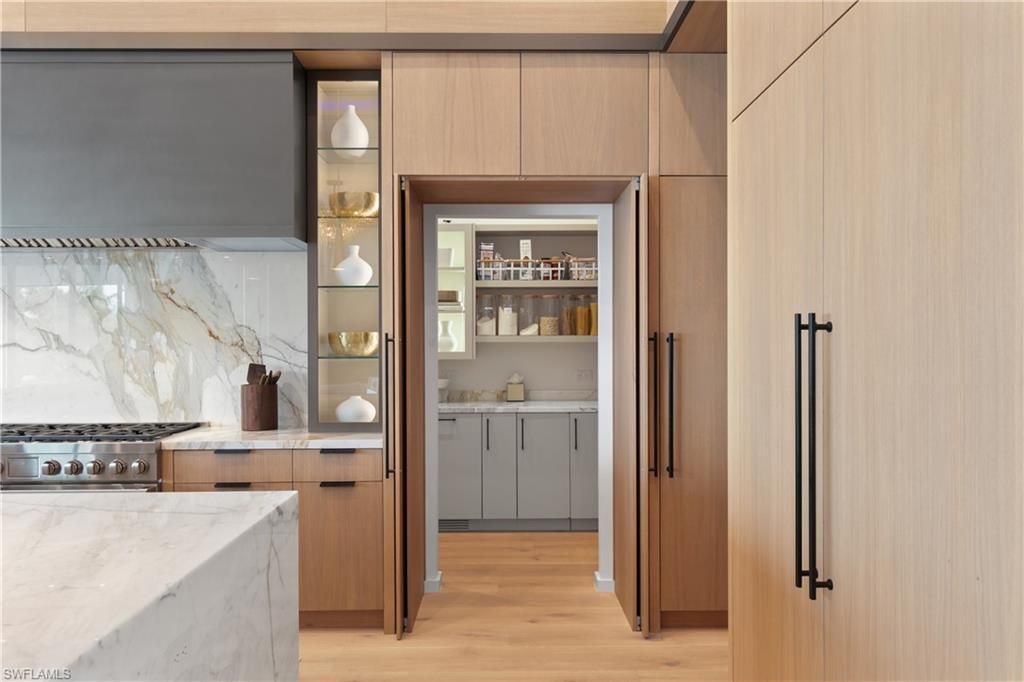 Interior, Kitchen, Marble Walls, Stainless Steel Appliances, Wood Texture Flooring