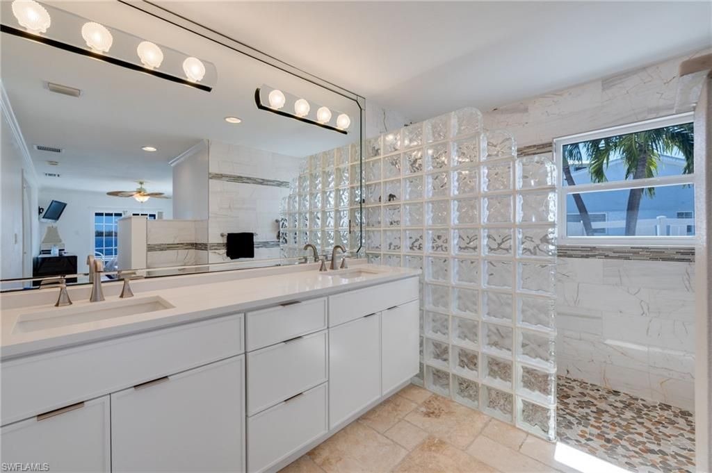 Bathroom, Dual Sink Vanities, Glass Shower, Interior, Marble Walls, Recessed Lighting
