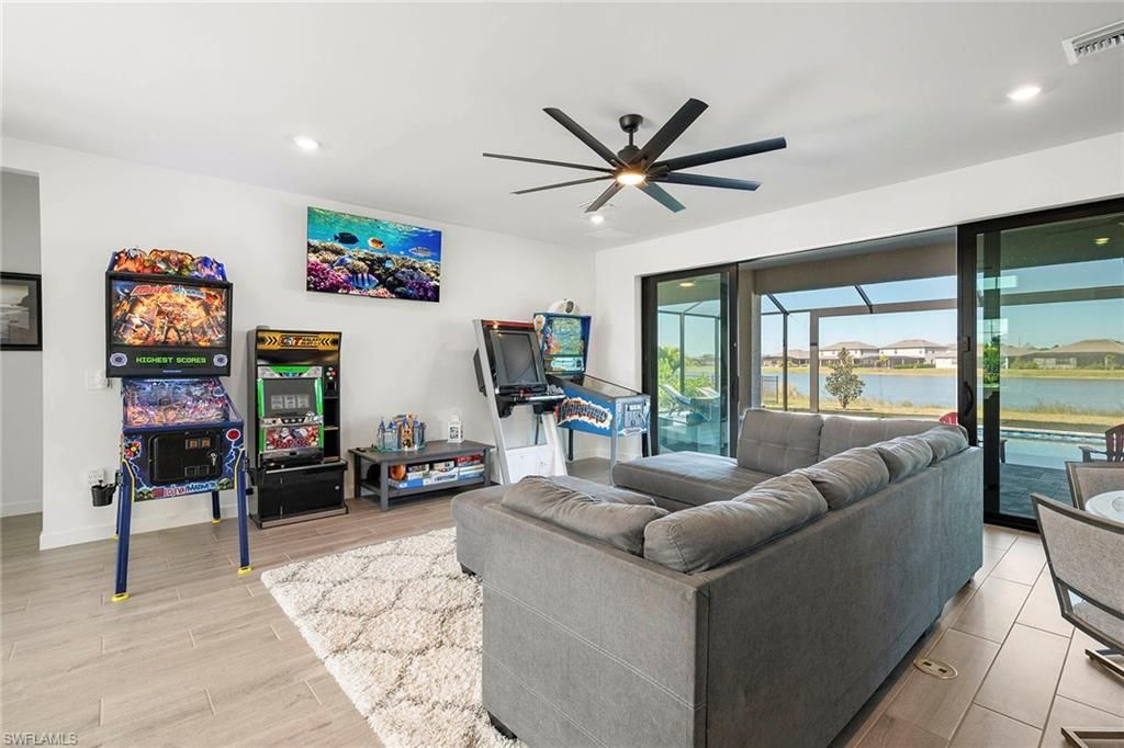 Game Room, Interior, Living room, Recessed Lighting, Water, Wood Texture Flooring