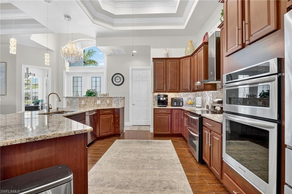 Chandelier, Interior, Kitchen, Pendant Lights, Stainless Steel Appliances, Wood Texture Flooring
