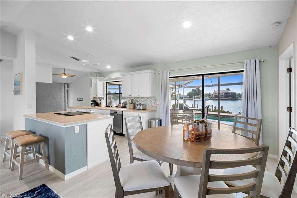 Dining room, Interior, Kitchen, Recessed Lighting, Water, Wood Texture Flooring