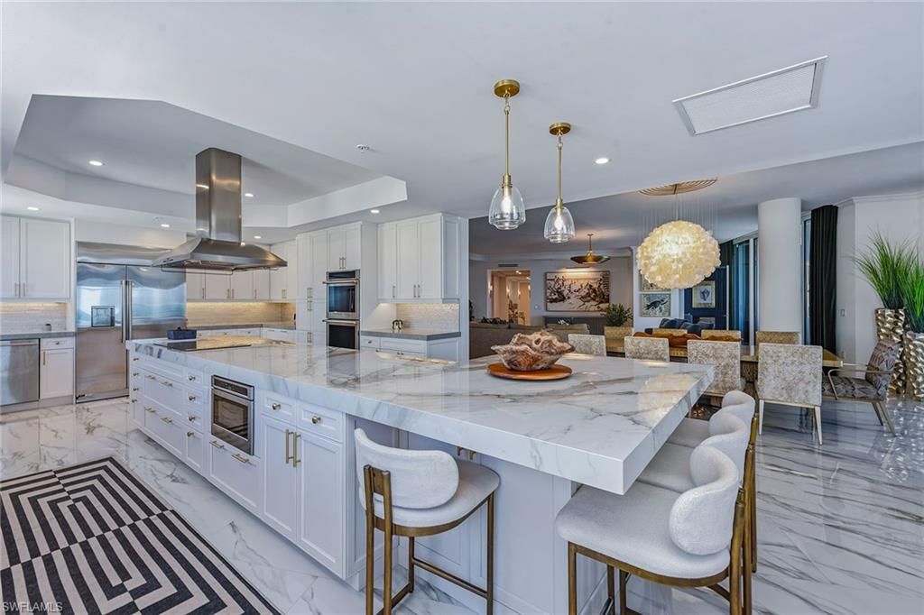 Chandelier, Dining room, Interior, Kitchen, Marble, Pendant Lights, Recessed Lighting, Stainless Steel Appliances