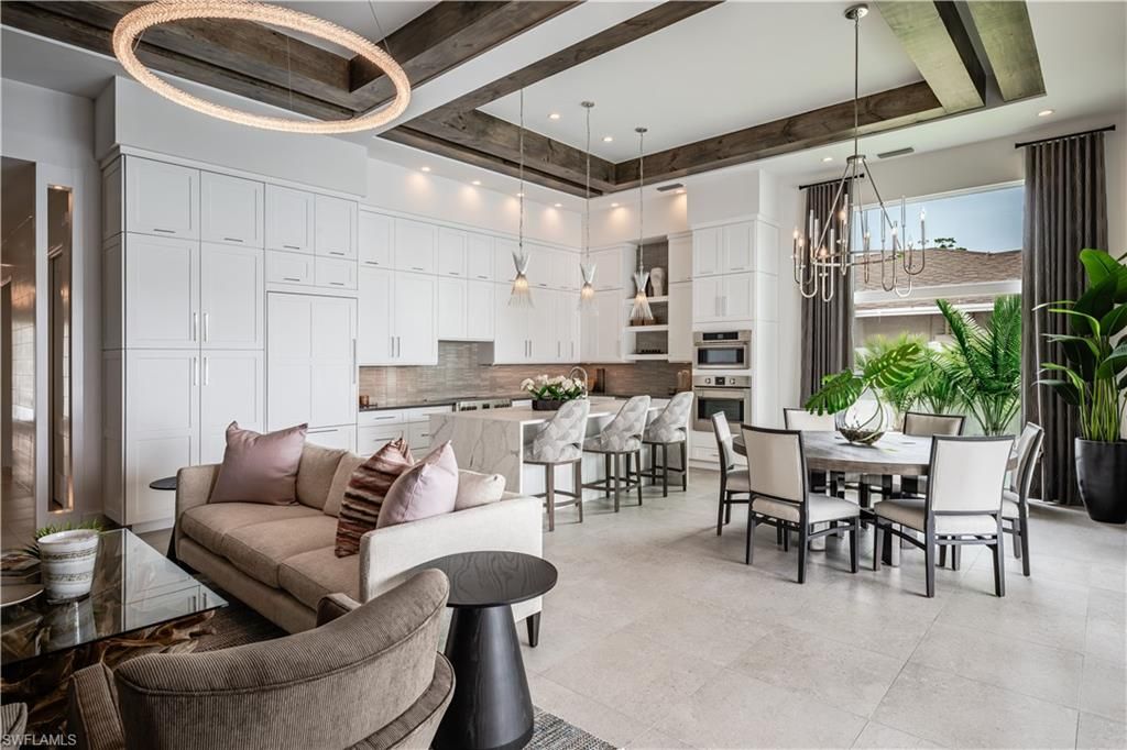 Chandelier, Dining room, Interior, Kitchen, Living room, Pendant Lights, Recessed Lighting, Stainless Steel Appliances, Wooden Beams