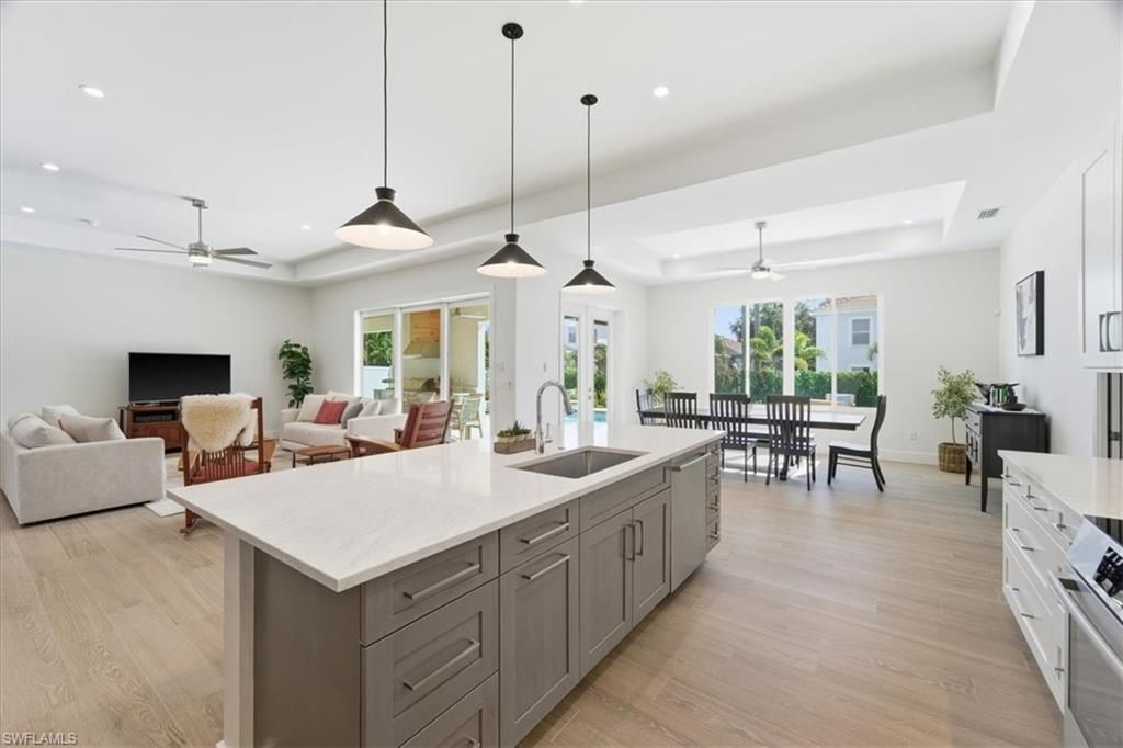 Dining room, Interior, Kitchen, Living room, Pendant Lights, Recessed Lighting, Stainless Steel Appliances, Wood Texture Flooring