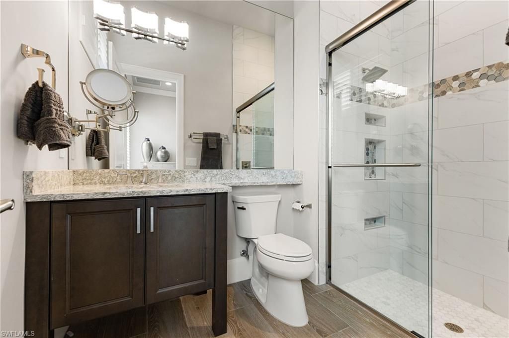 Bathroom, Glass Shower, Interior, Marble Walls, Wood Texture Flooring