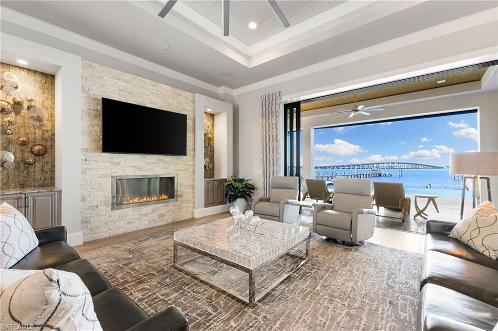 Fireplace, Interior, Living room, Recessed Lighting, Stone Walls, Water