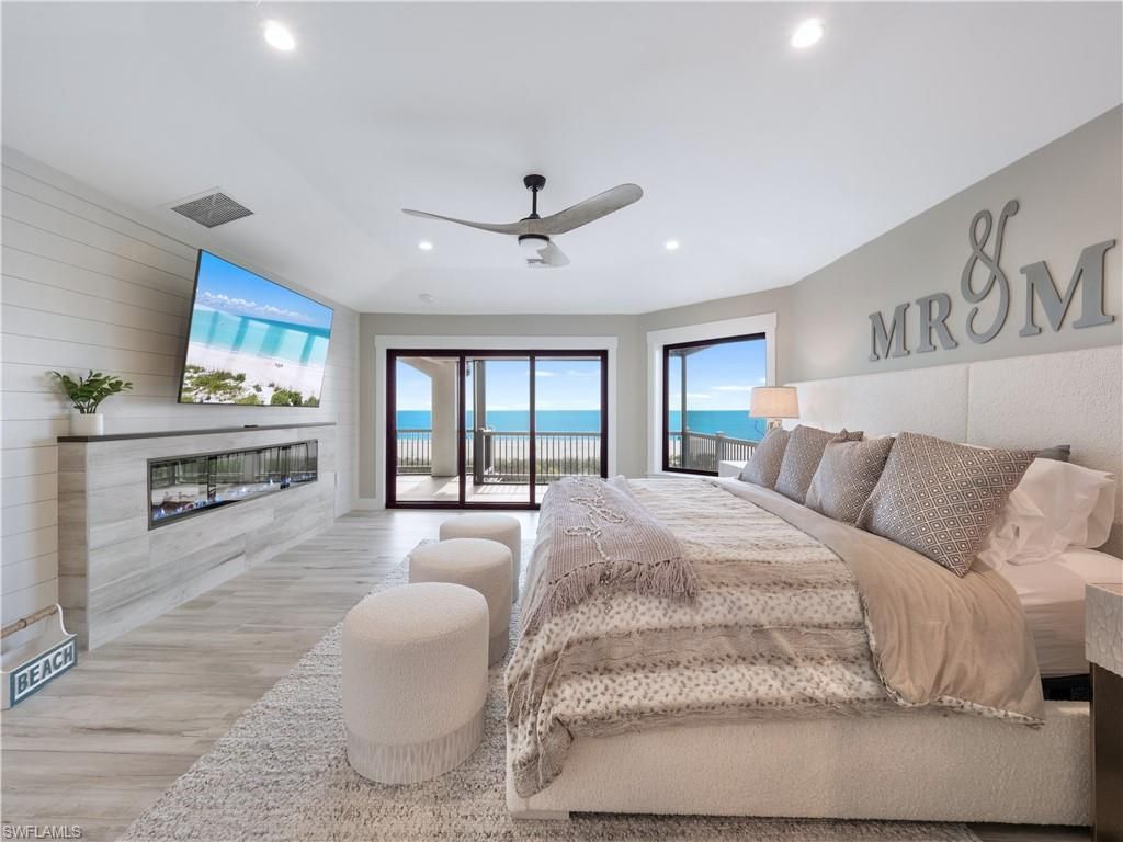 Bedroom, Fireplace, Interior, Recessed Lighting, Water, Wood Texture Flooring