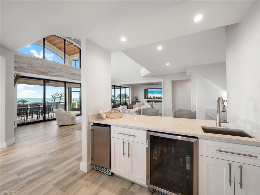 Dining room, Interior, Kitchen, Recessed Lighting, Stainless Steel Appliances, Water, Wood Texture Flooring