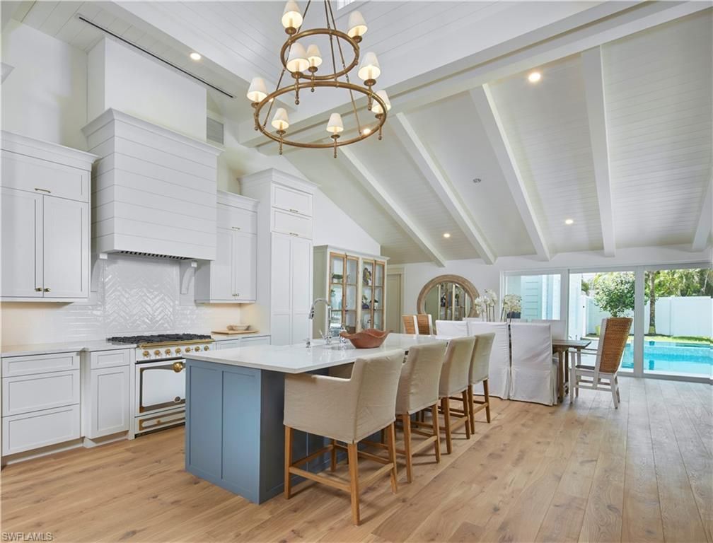Chandelier, Dining room, Interior, Kitchen, Pendant Lights, Recessed Lighting, Stainless Steel Appliances, Wood Texture Flooring