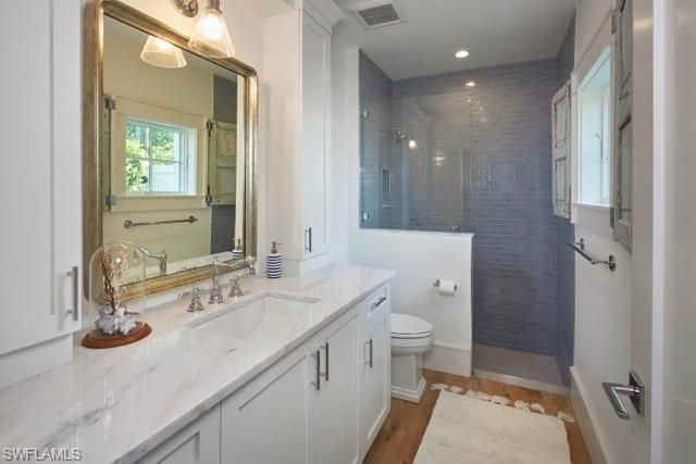 Bathroom, Glass Shower, Interior, Recessed Lighting, Wood Texture Flooring