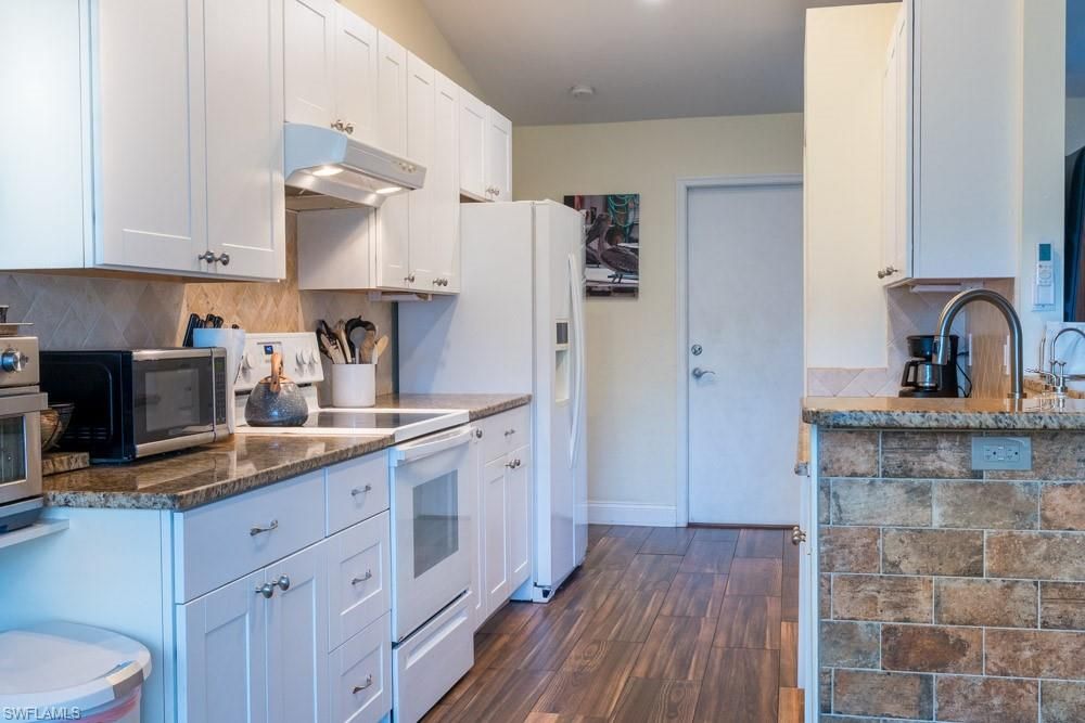 Interior, Kitchen, Recessed Lighting, Stone Walls, Wood Texture Flooring