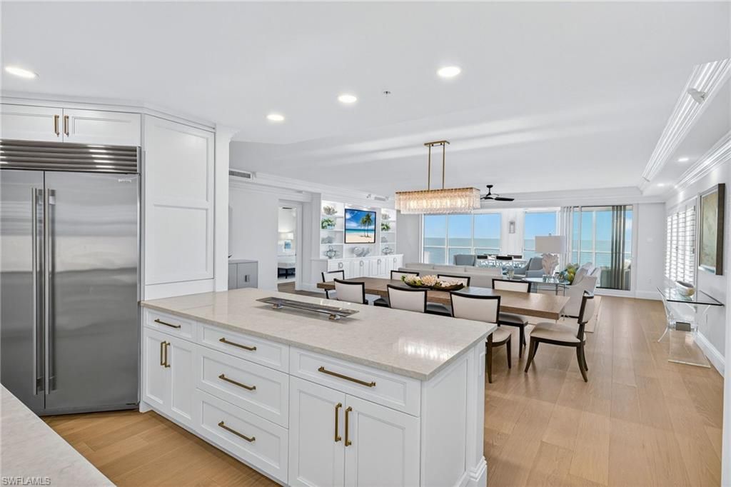 Chandelier, Dining room, Interior, Kitchen, Pendant Lights, Recessed Lighting, Stainless Steel Appliances, Water, Wood Texture Flooring