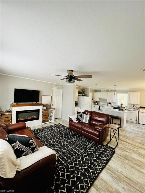 Fireplace, Interior, Kitchen, Living room, Pendant Lights, Wood Texture Flooring