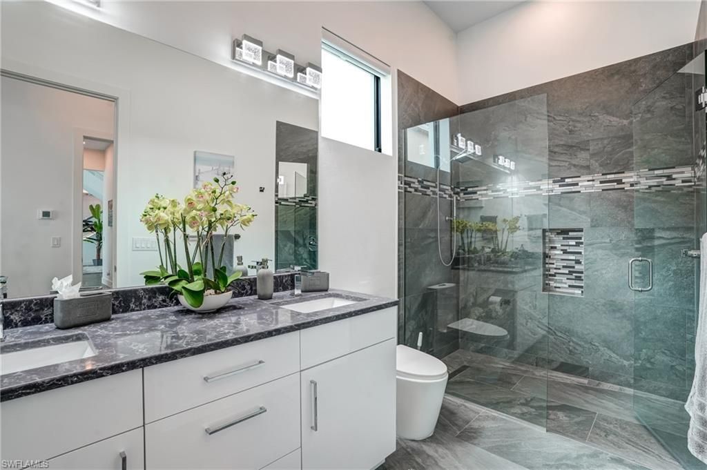 Bathroom, Dual Sink Vanities, Glass Shower, Interior, Marble Walls