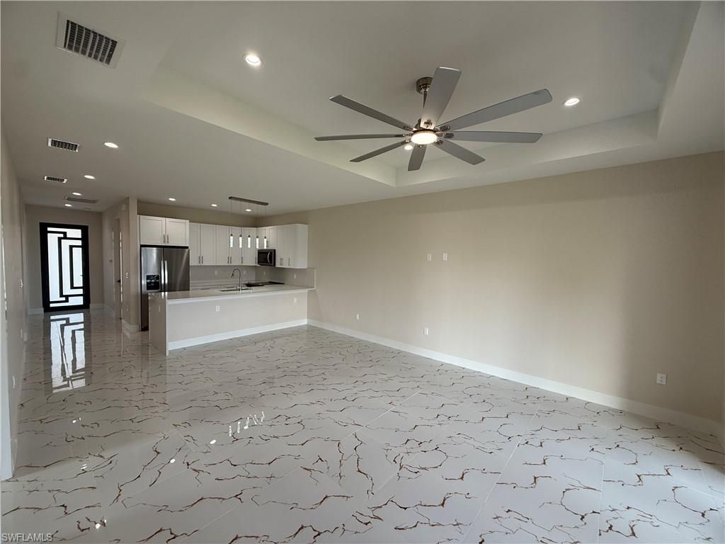Empty room, Interior, Kitchen, Marble, Recessed Lighting, Stainless Steel Appliances